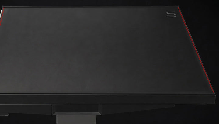 Arc Pro Standing Desk raised to standing height with a dual-motor lift column visible