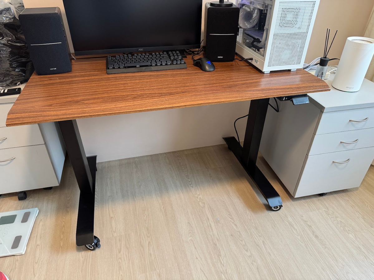 ULTI standing desk arranged as a practical everyday home office