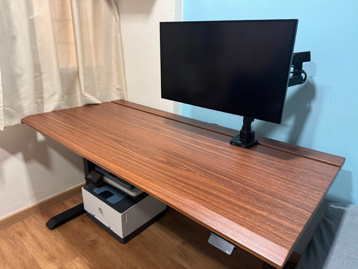 Walnut ULTI Arc Pro desk with a single monitor arm